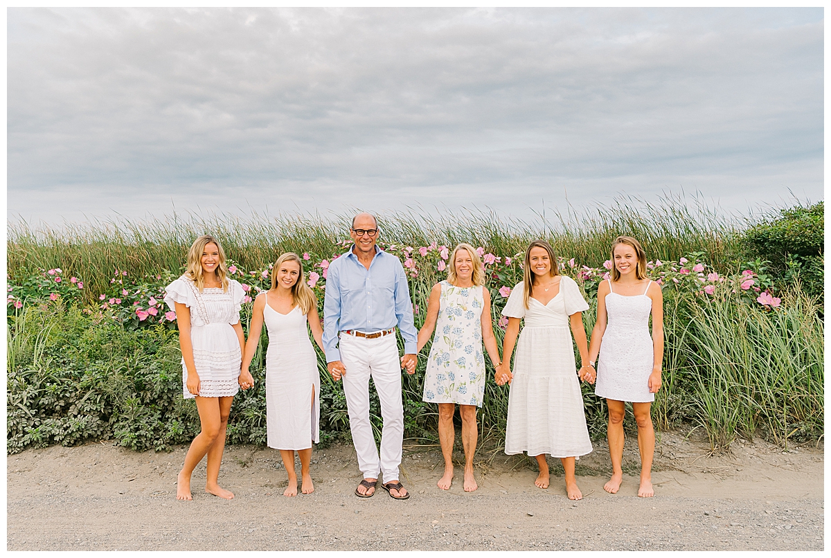Emily's Nantucket Family holding hands at Miacomet Beach